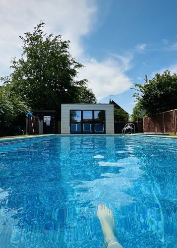 The pool and summerhouse